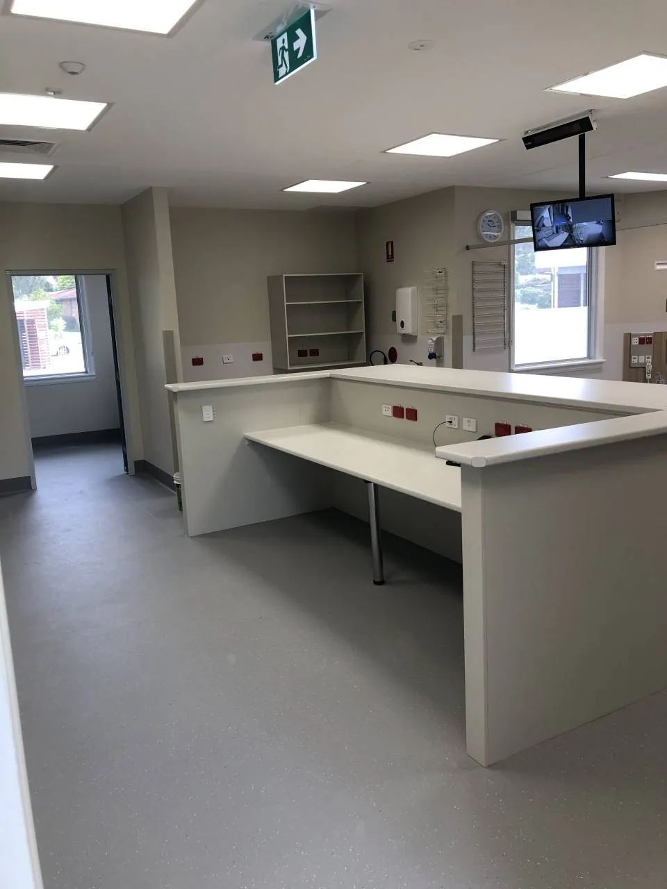 A Large Room with A Desk and A Television on The Ceiling — Nambucca Plumbing in Nambucca Heads, NSW