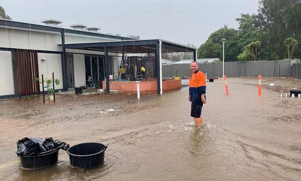 Plumber Working on A Rainy Day