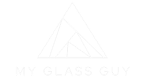 A white logo with a triangle and the words `` my glass guy '' on a white background.