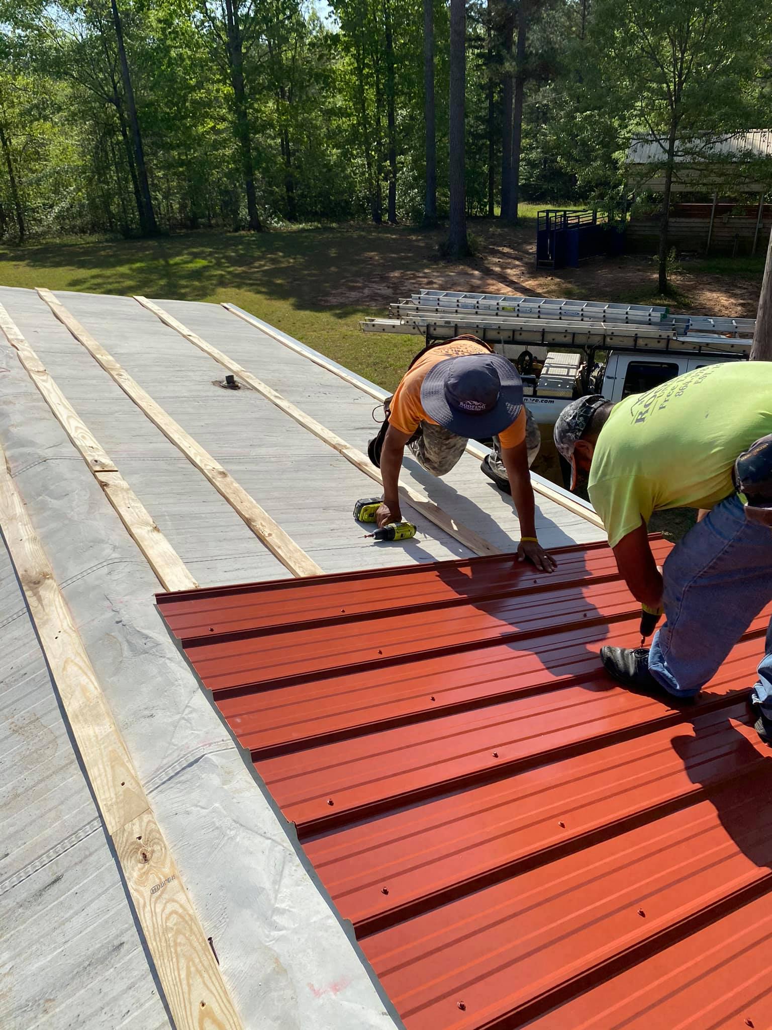 Installing Metal Roof — Greenwood, SC — Roofing Unlimited & More