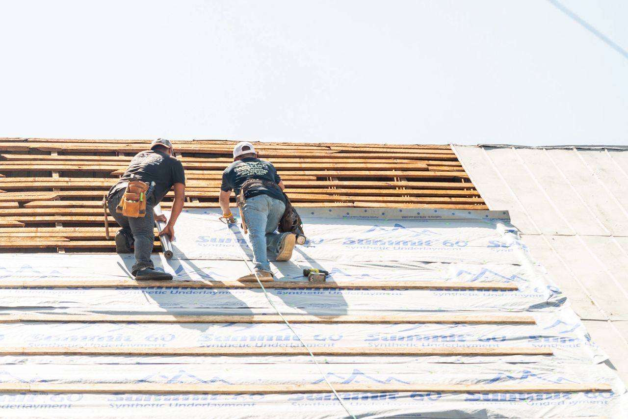 Two Workers At The Roof — Greenwood, SC — Roofing Unlimited & More