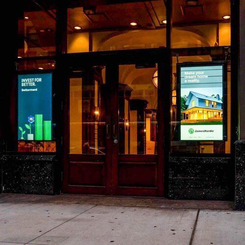 A building with a sign that says invest for better
