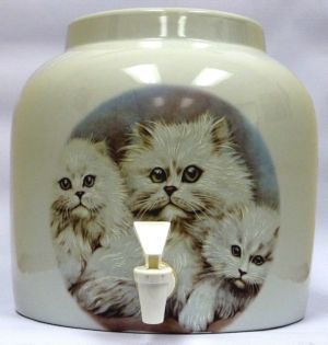 Ceramic water dispenser with fluffy white cat portrait; beige, white spout.