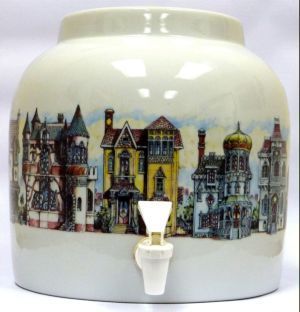 White ceramic water dispenser with cherub painting and white spigot.