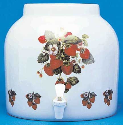 White ceramic beverage dispenser with strawberry decal. White spigot at the bottom.