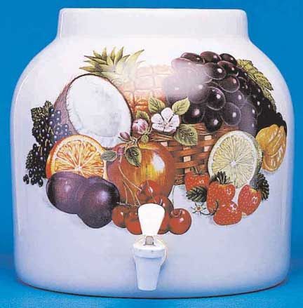 White ceramic beverage dispenser with fruit decal and spigot.