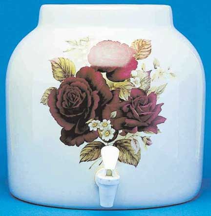 White ceramic water dispenser with floral rose design.