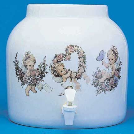 White ceramic water dispenser with cherubim and floral design.