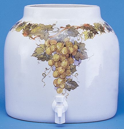White ceramic water dispenser with grape vine design and white spigot.