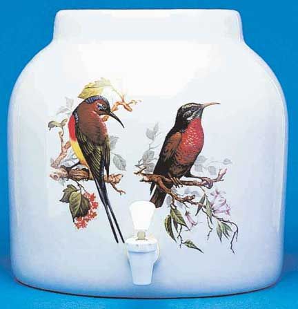 White ceramic water dispenser with two illustrated birds on branches.