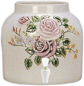 White ceramic water dispenser with cherub painting and white spigot.