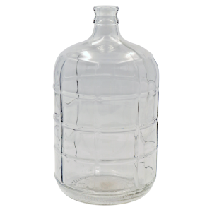 Clear glass jug with handle and white cap.