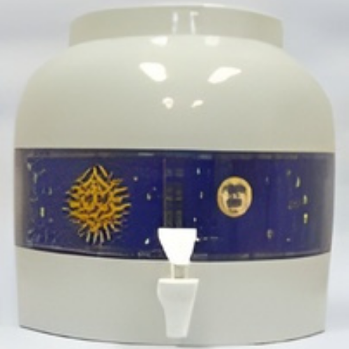 White ceramic water dispenser with blue band featuring sun, moon, and stars. White spigot at the bottom.