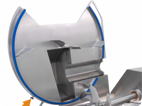 A close up of a stainless steel machine with the lid open