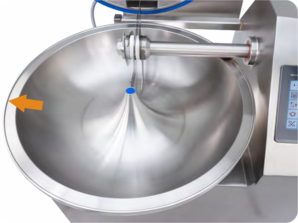 A stainless steel bowl with an orange arrow pointing to it