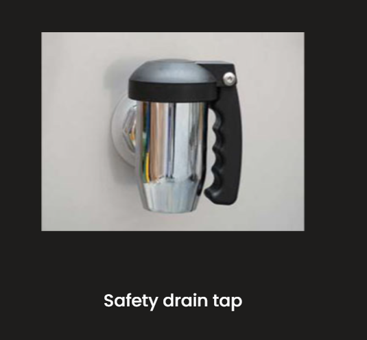 A picture of a safety drain tap on a wall