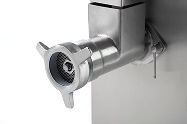 A close up of a stainless steel meat grinder on a white background.