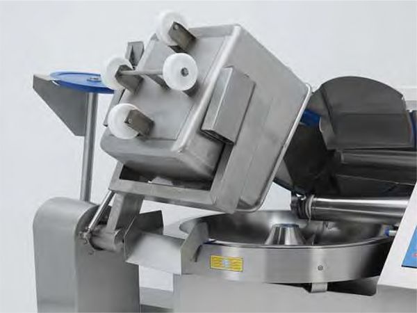 A stainless steel machine with a container on top of it