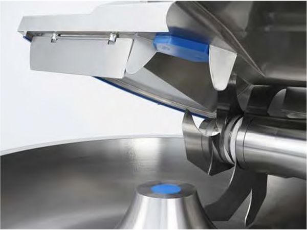 A close up of a stainless steel machine with a blue handle