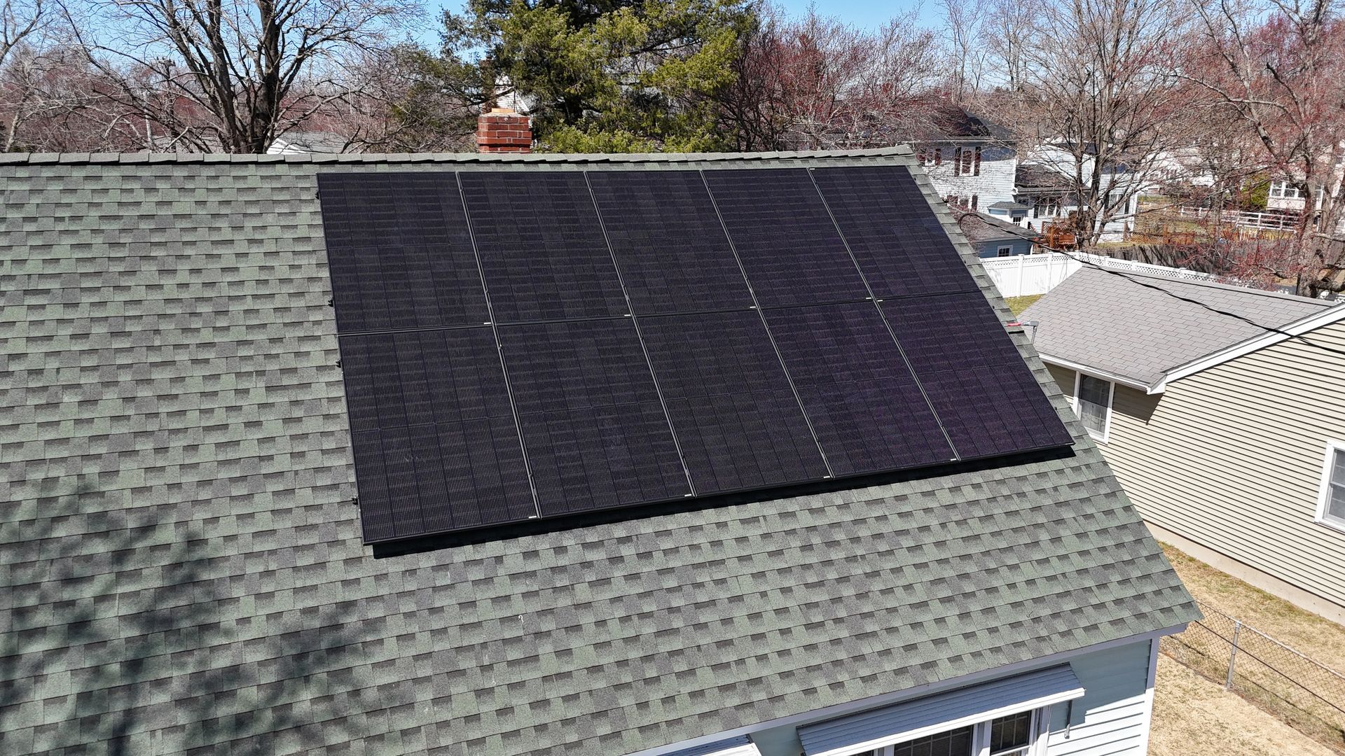A house with solar panels on the roof.