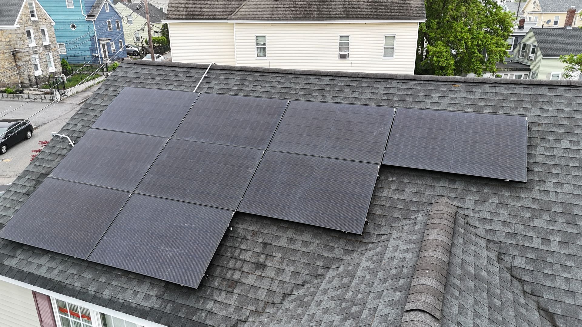A roof with a lot of solar panels on it
