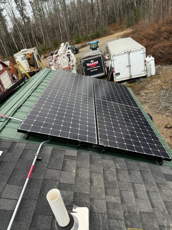 A roof with a lot of solar panels on it