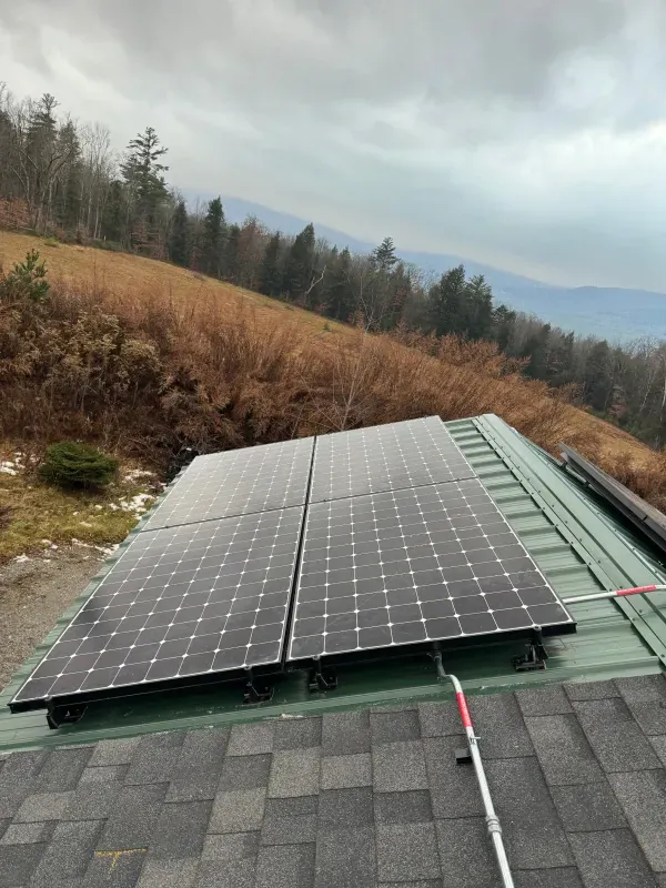 A roof with a lot of solar panels on it