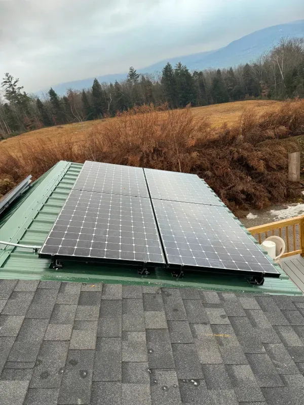 A roof with a lot of solar panels on it