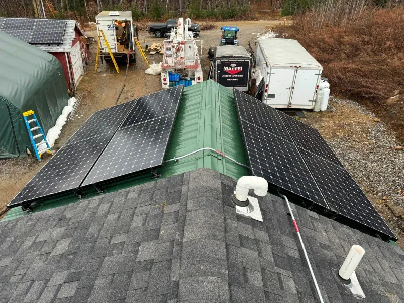 A roof with a lot of solar panels on it