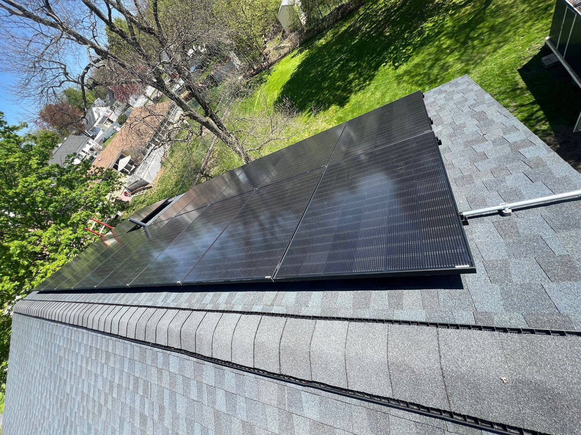 A roof with a lot of solar panels on it.