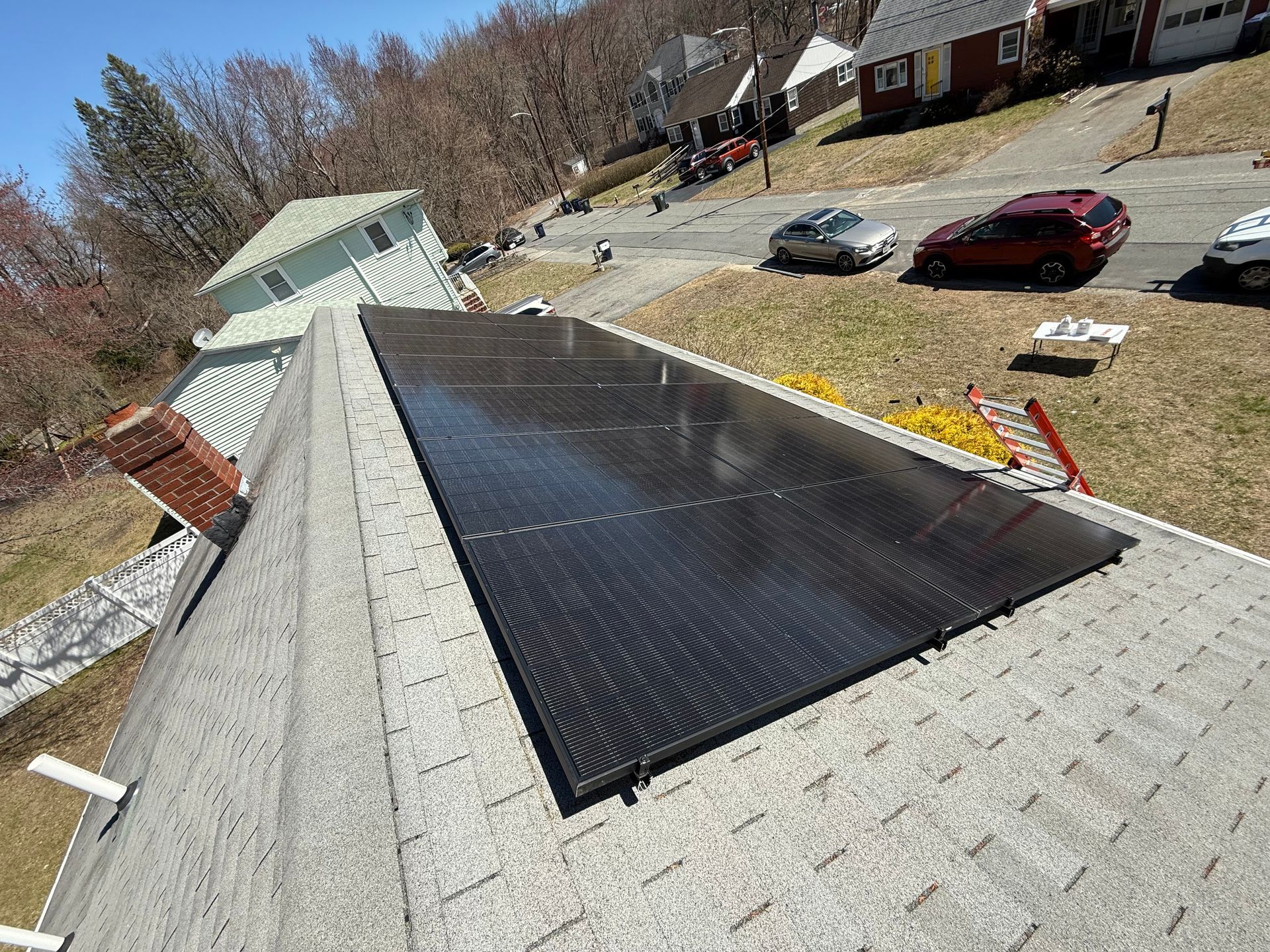 A roof with a lot of solar panels on it