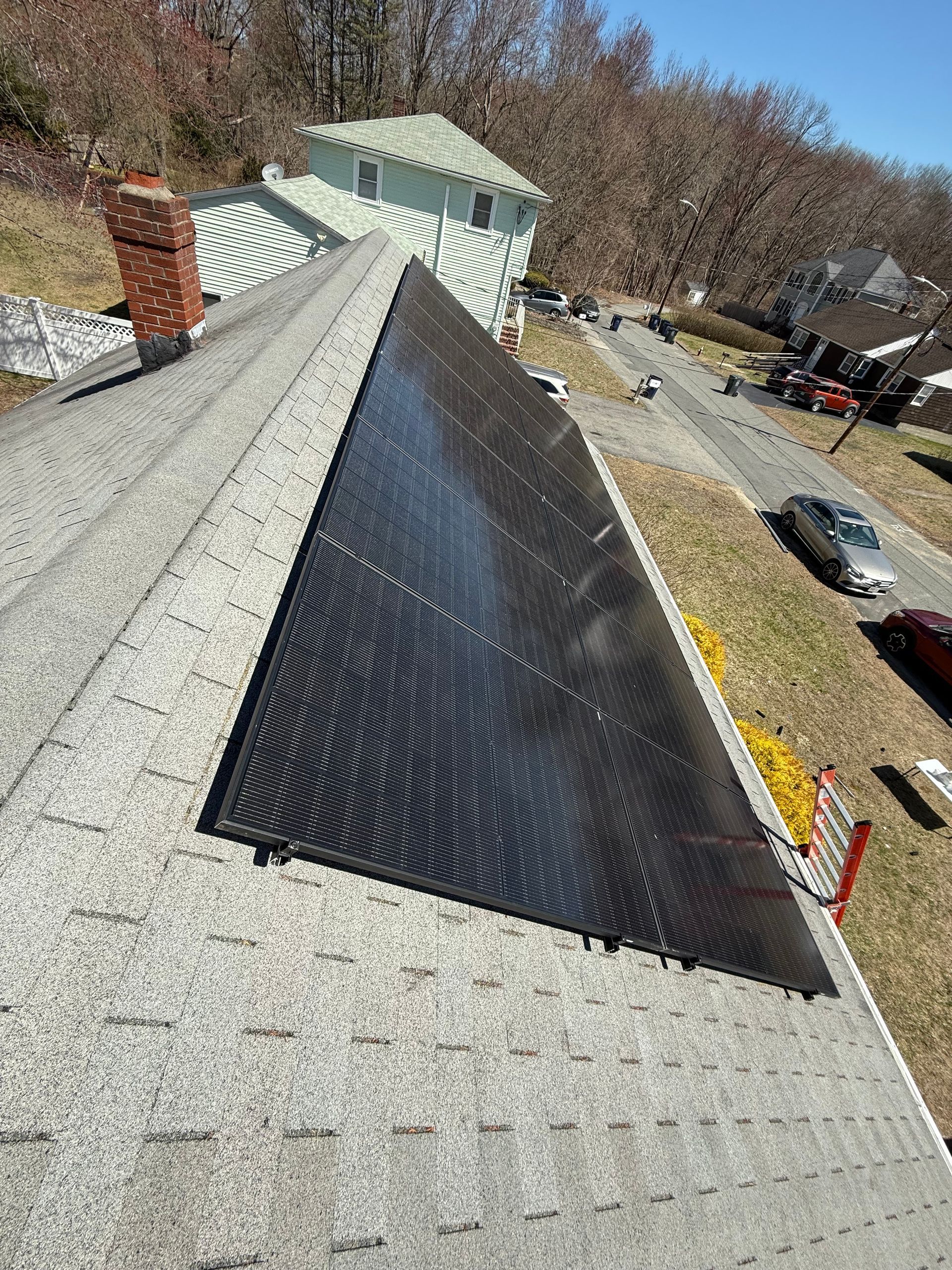 A roof with a lot of solar panels on it.