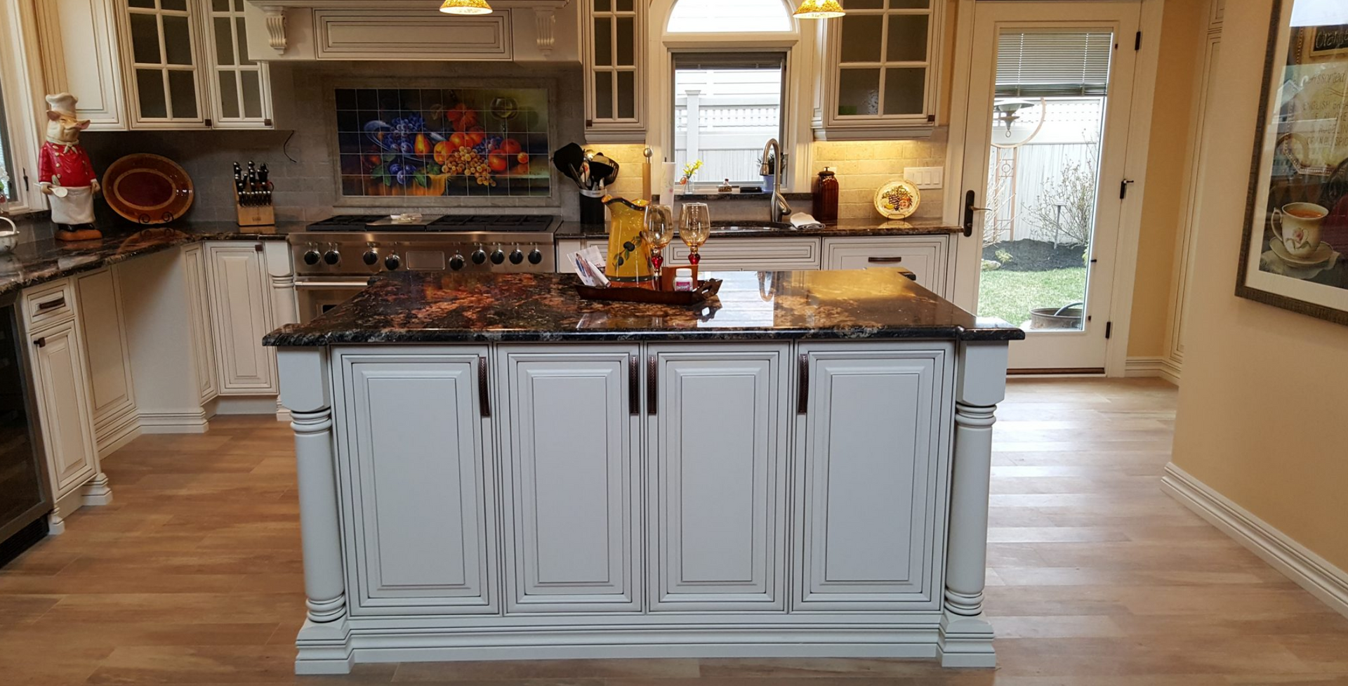 A kitchen with a large island in the middle of it.