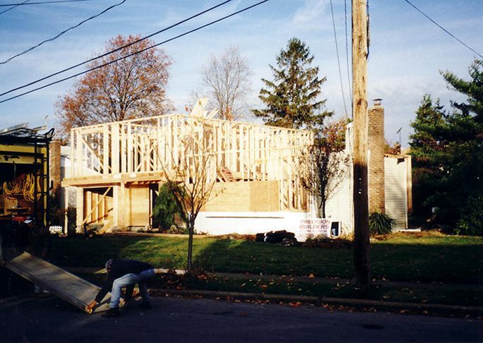 A house is being built on the side of the road