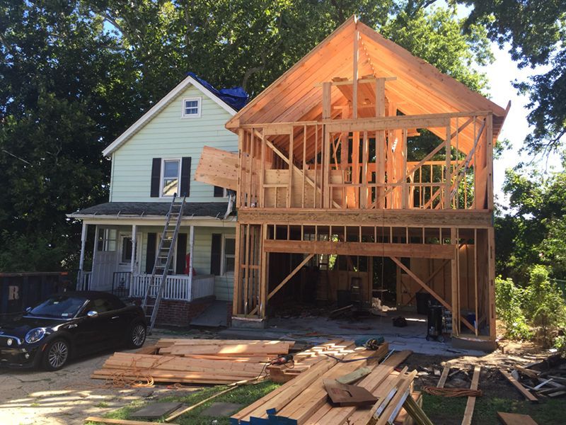 A house is being built with a garage underneath it