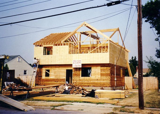 A house that is being built with a sign that says no parking