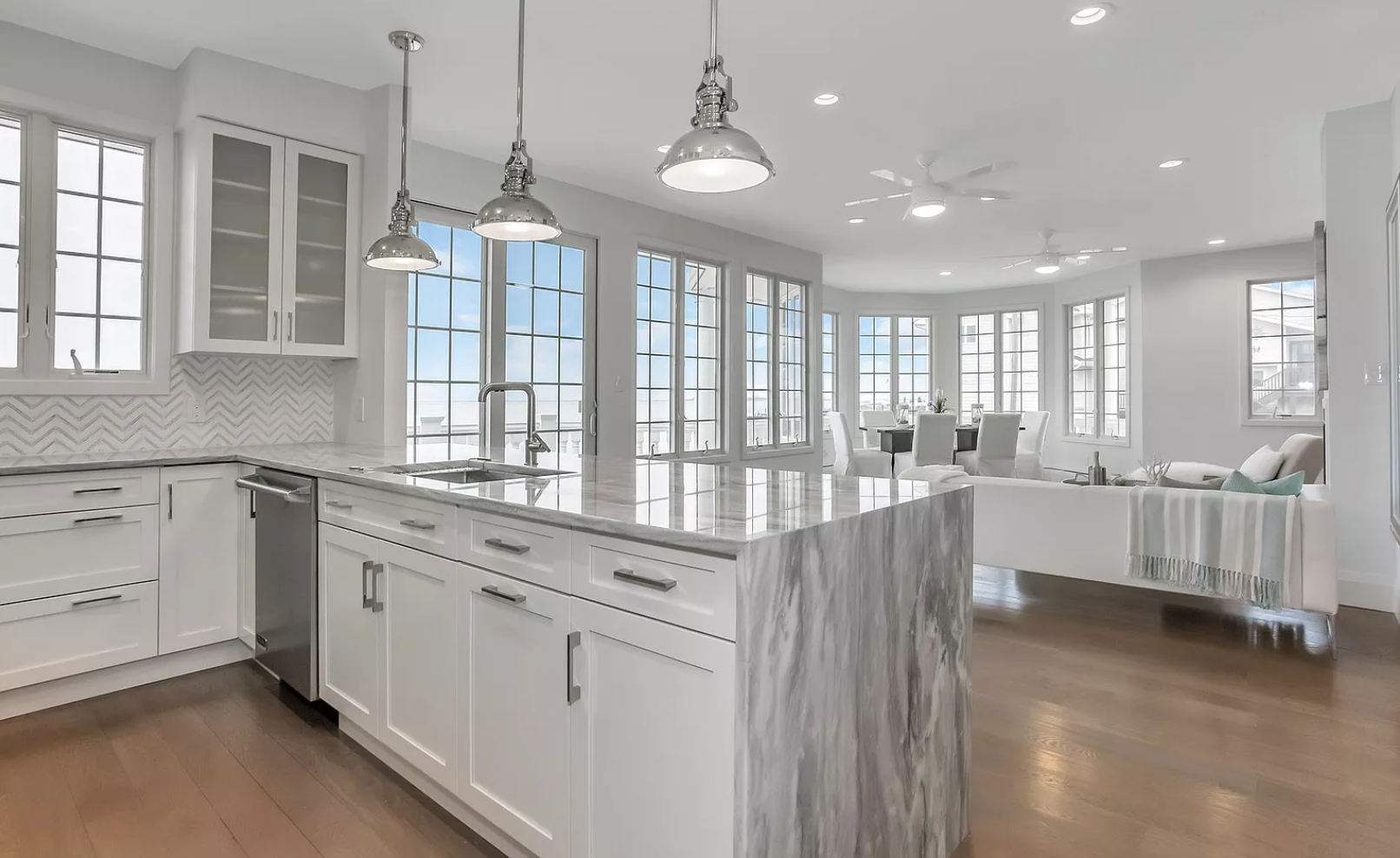 There is a large island in the middle of the kitchen.