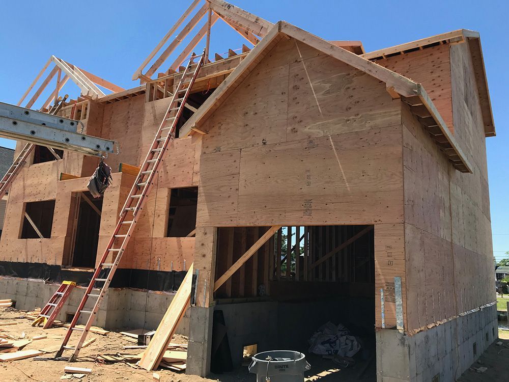 A house is being built with a garage underneath it