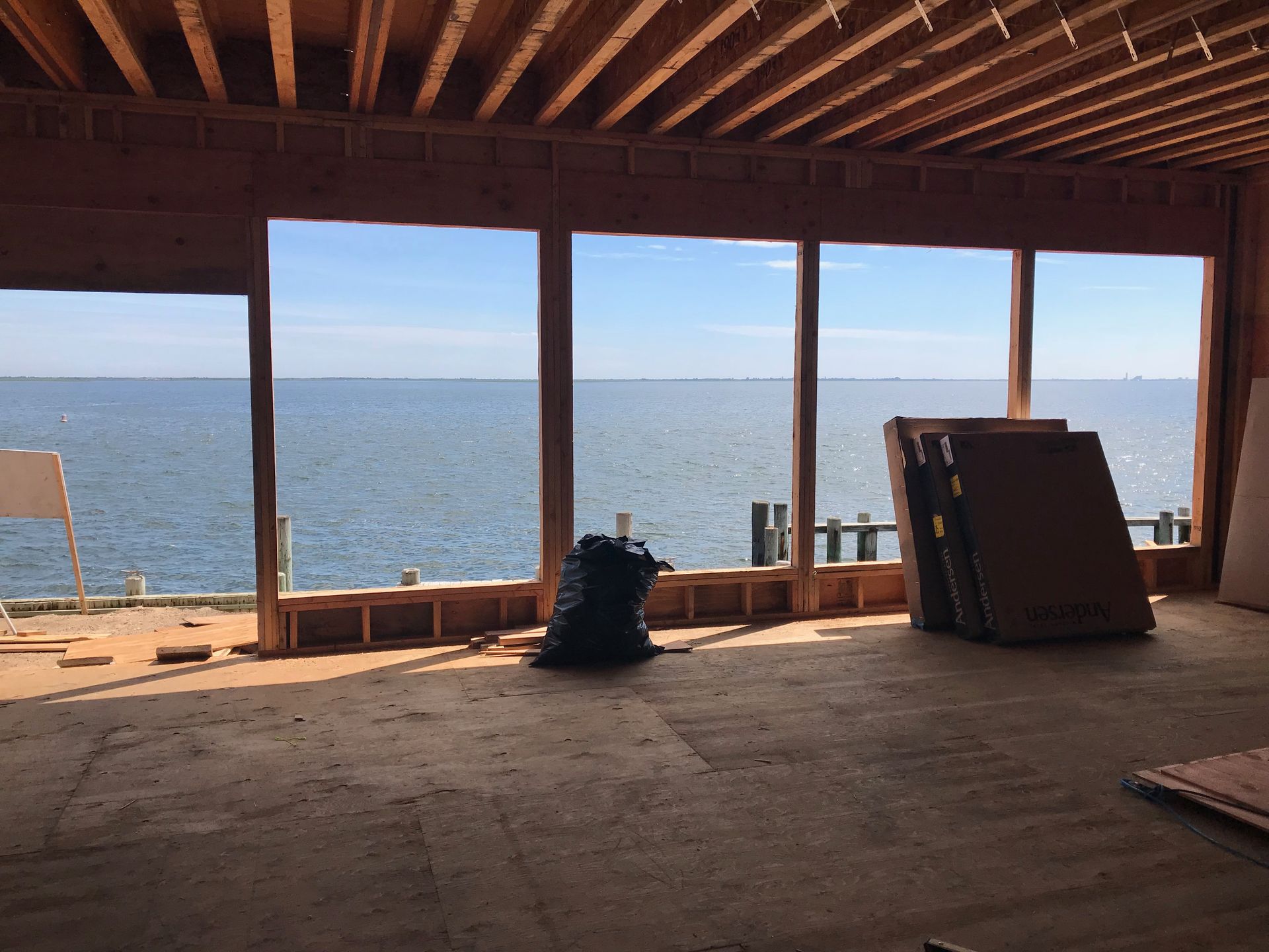 A house under construction with a view of the ocean