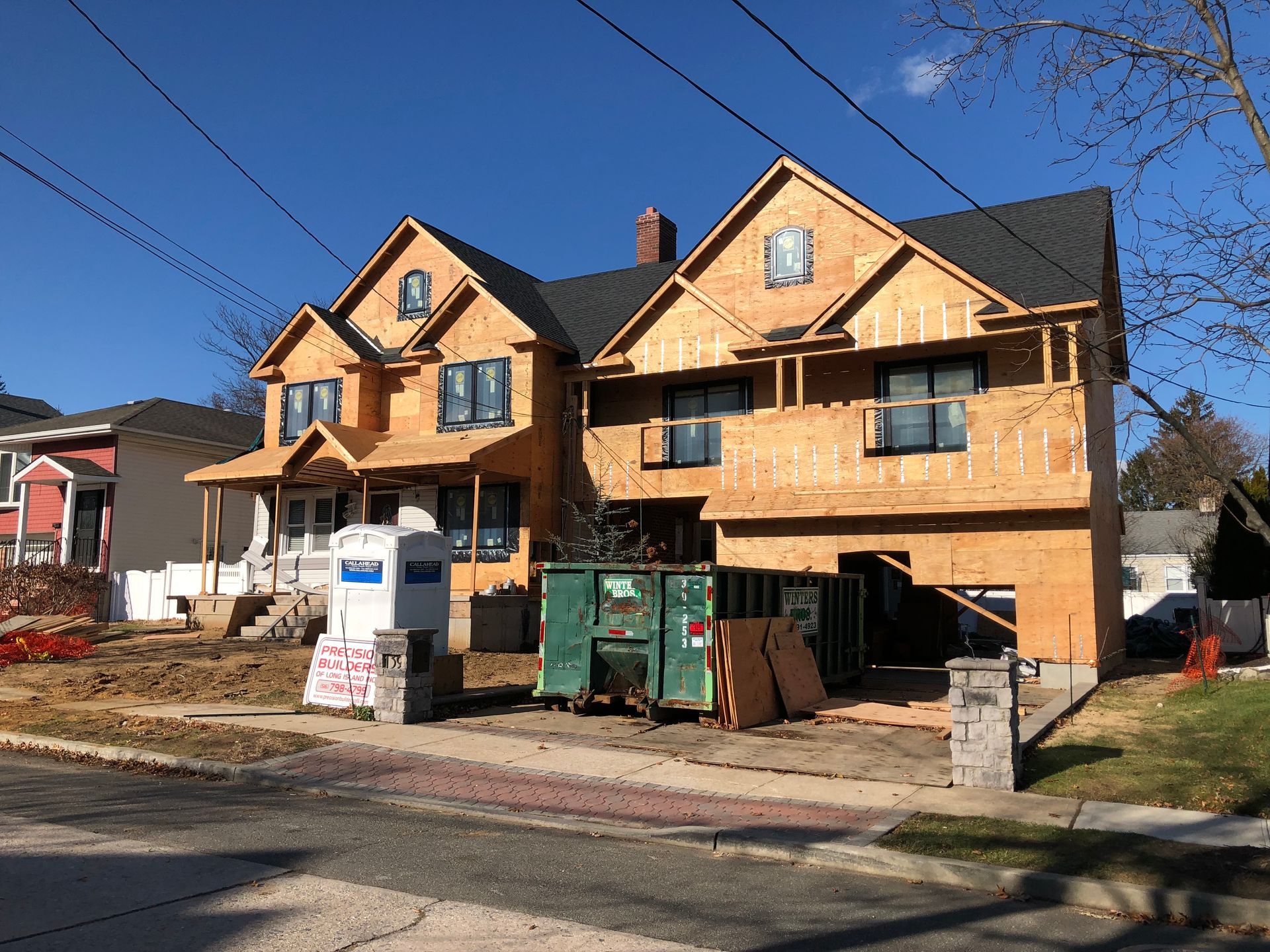 A house is being built on the side of the road.