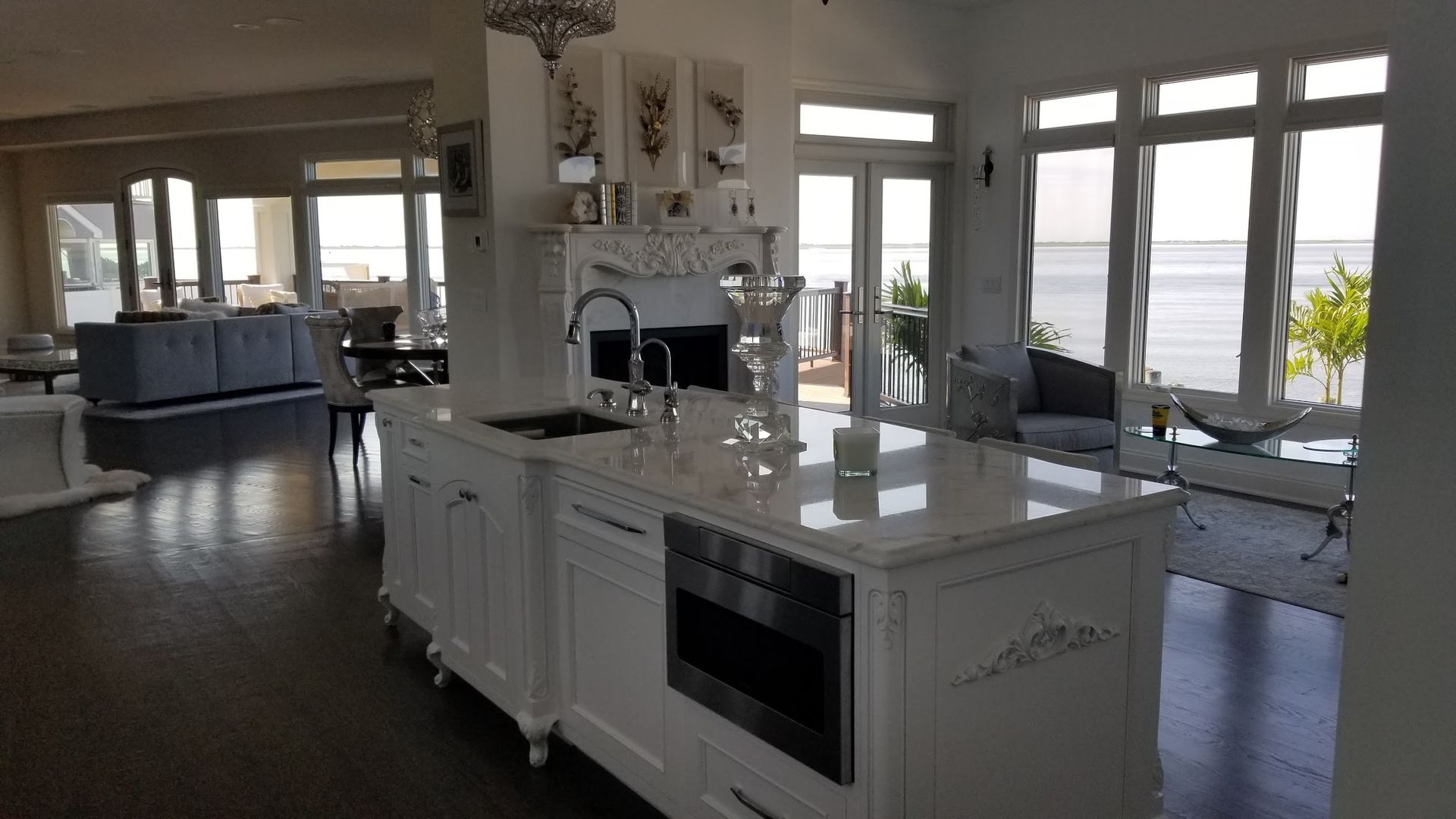 A kitchen with a large island in the middle of the room.
