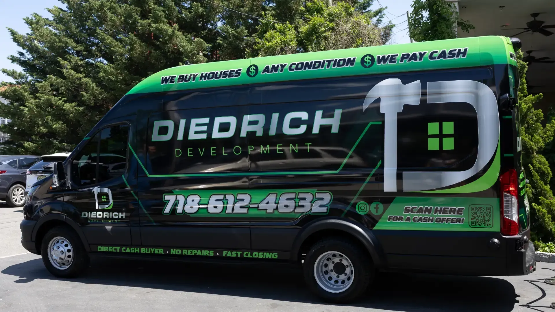 Green Diedrich service van parked outdoors, with black and neon green branding and phone number on the side