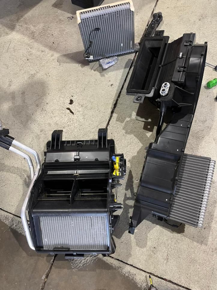 A Car Air Conditioner is Being Repaired on the Ground — BA Auto Electrical In West Mackay, QLD