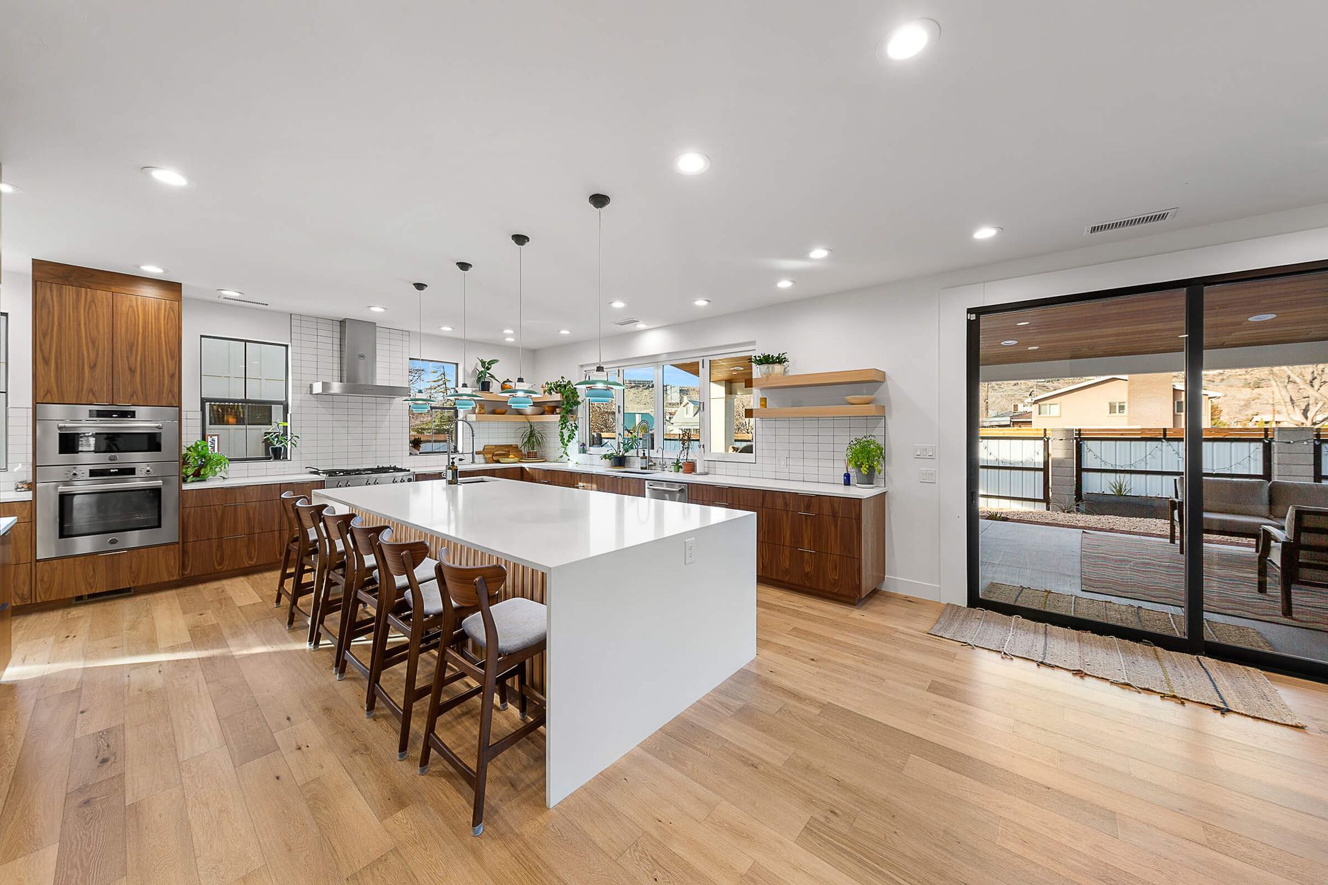 There is a large island in the middle of the kitchen.