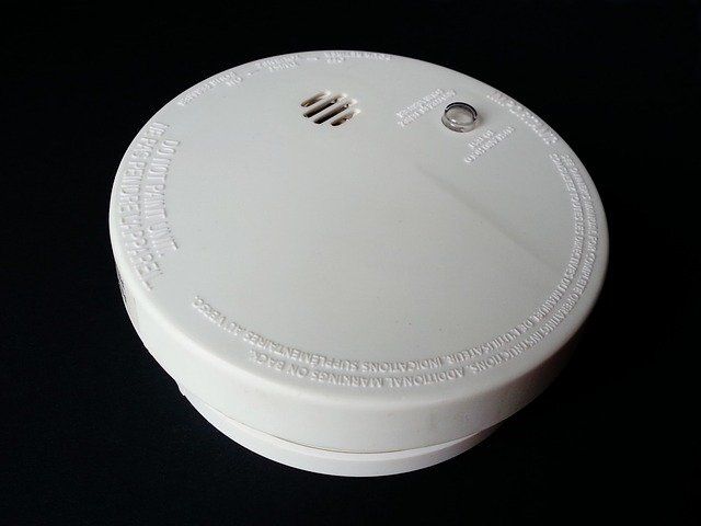 close up of a white smoke detectors in rentals