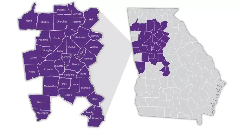 A purple map of georgia is shown next to a white map