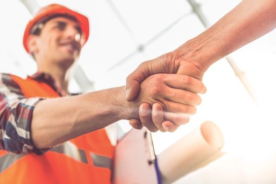 two men shaking hands
