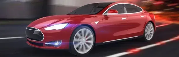Red sports coupe driving on a dark road with motion blur and glowing light trails