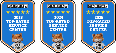 Three badges that say carfax top rated service center | Safari Automotive