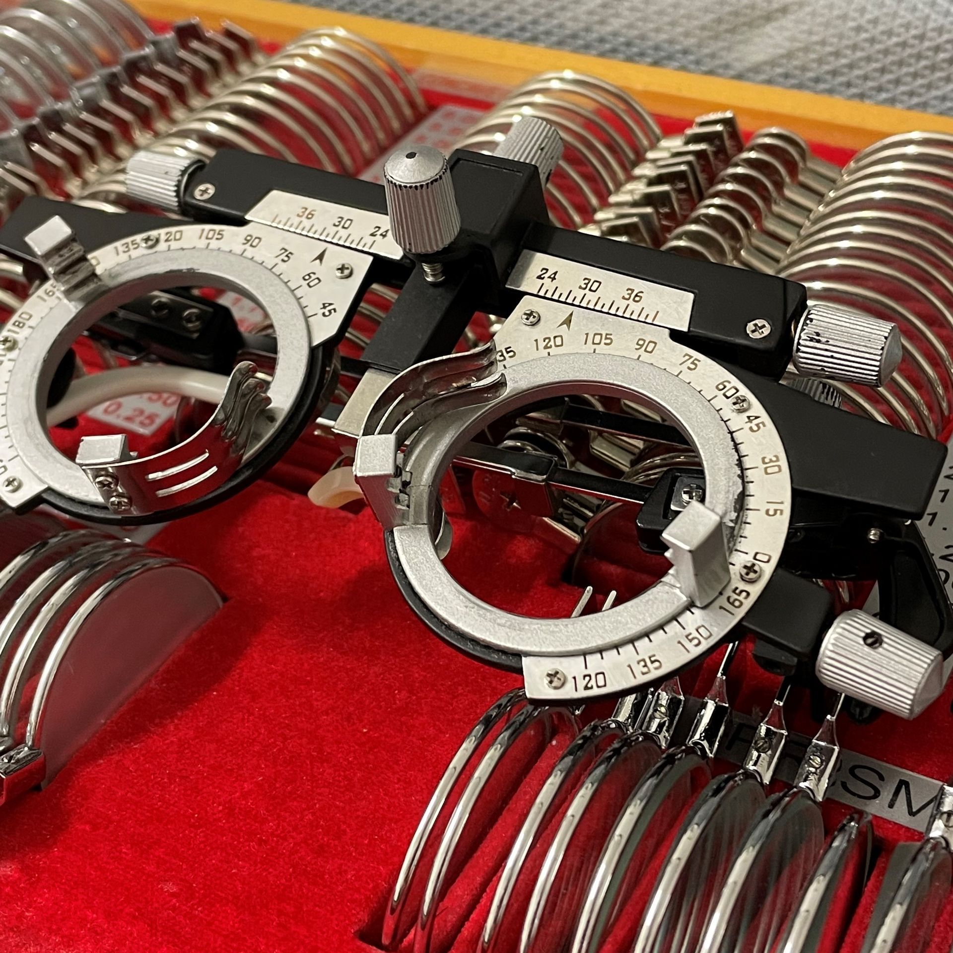 The optometrist checks the patient's eyes with an eye chart.  — Optometrist in Wallsend, NSW